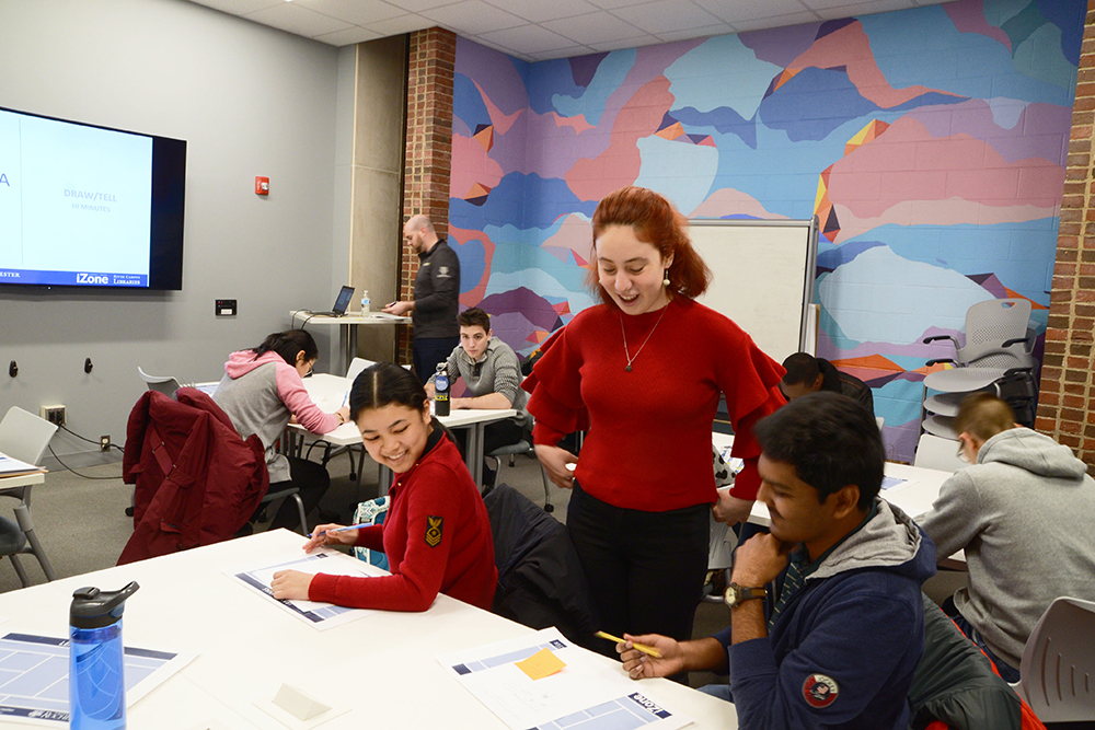 A group of students working on a business plan.